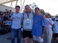 State League team manager, Chris O'Connor; Ronnie Buckley with his World Youth Championship Gold Medal; and Club President, Graeme Olden