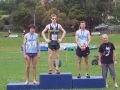 Medal Presentation for the Victorian Mile Championship  The medallists with former champion, Trevor Vincent